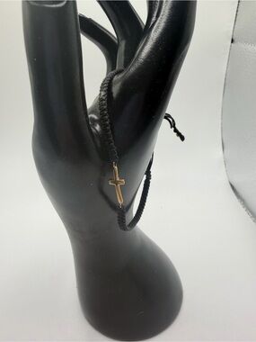Black string Bracelet with 10k yellow Gold Cross Charm